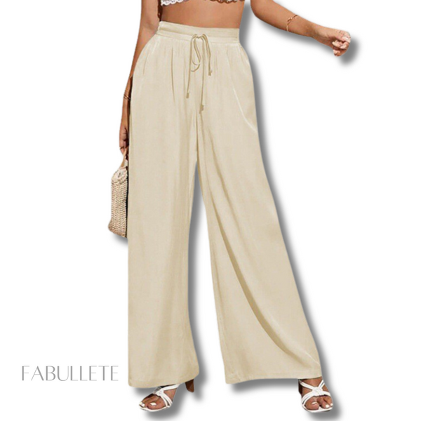 Tendências e estilos únicos com calça YasmimModa feminina elegante e confortávelElegância e conforto em um só produtoCalça versátil para todas as ocasiõesCalça que destaca a silhuetaCalça pantalona YasmimCalça pantalona de alta qualidadeBeleza e movimento na calça pantalonaModa femininaroupa de mulhercalçacalça pantalona