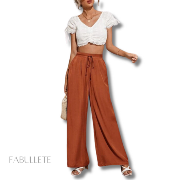 Tendências e estilos únicos com calça YasmimModa feminina elegante e confortávelElegância e conforto em um só produtoCalça versátil para todas as ocasiõesCalça que destaca a silhuetaCalça pantalona YasmimCalça pantalona de alta qualidadeBeleza e movimento na calça pantalonaModa femininaroupa de mulhercalçacalça pantalona