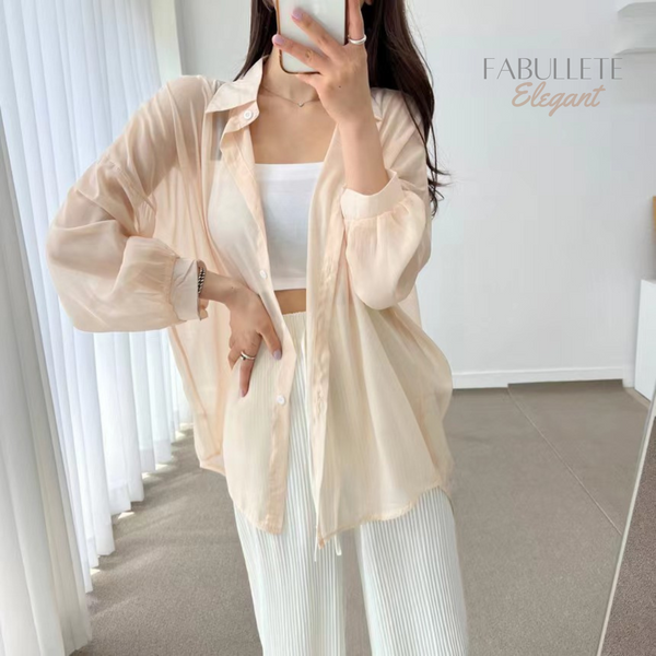 Roupa para ocasiões especiaisModa versátilestilo sofisticadoElegância femininaChiffon de qualidadeCamisa sobretudoCamisa Feminina Estilo Sobretudo em Chiffoncamisa estilo sobretudocamisa em chifoncamisa em chiffonCamisa chiffon