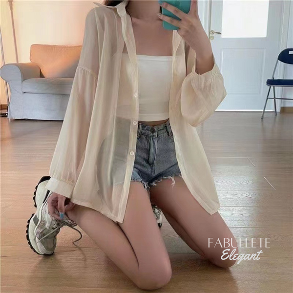 Roupa para ocasiões especiaisModa versátilestilo sofisticadoElegância femininaChiffon de qualidadeCamisa sobretudoCamisa Feminina Estilo Sobretudo em Chiffoncamisa estilo sobretudocamisa em chifoncamisa em chiffonCamisa chiffon