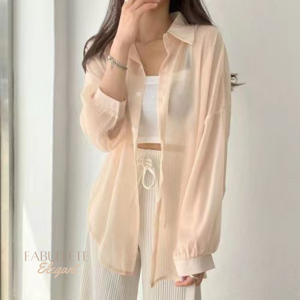 Roupa para ocasiões especiaisModa versátilestilo sofisticadoElegância femininaChiffon de qualidadeCamisa sobretudoCamisa Feminina Estilo Sobretudo em Chiffoncamisa estilo sobretudocamisa em chifoncamisa em chiffonCamisa chiffon