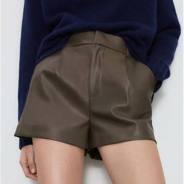Short feminino couroModa versátilEstilo casual sofisticadoElegância em couroDurabilidade de couroConforto luxuosoModa femininaShort Couroshort em couroshort