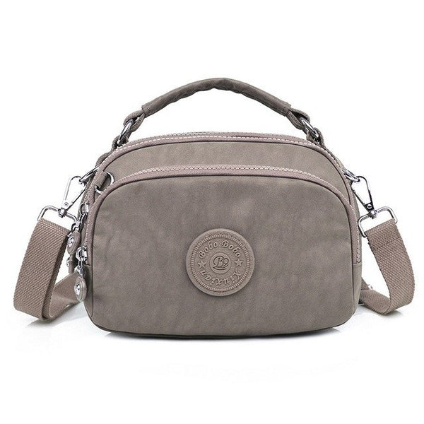 bolsa kiplybolsa impermeávelbolsa feminina kiplybolsa femininaBolsa Compacta Impermeávelbolsabolsa compactabolsa de mulherbolsa dia a diabolsa pequena