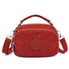 bolsa kiplybolsa impermeávelbolsa feminina kiplybolsa femininaBolsa Compacta Impermeávelbolsabolsa compactabolsa de mulherbolsa dia a diabolsa pequena