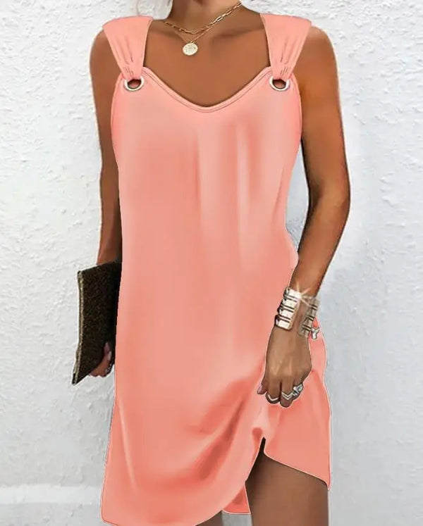 Vestuário minimalistaVestido sem Mangas Reto com Ilhósvestido sem mangasvestido com ilhósVersatilidade modernaLeveza e confortoEstilo contemporâneovestidovestido da modavestido longovestido leve
