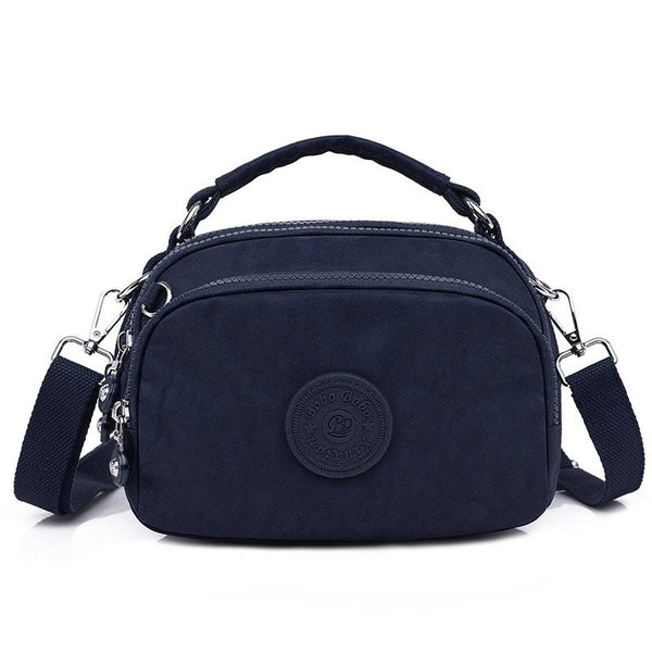 bolsa kiplybolsa impermeávelbolsa feminina kiplybolsa femininaBolsa Compacta Impermeávelbolsabolsa compactabolsa de mulherbolsa dia a diabolsa pequena
