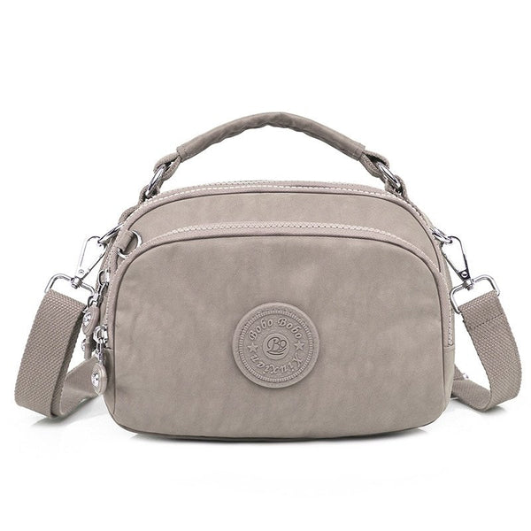 bolsa kiplybolsa impermeávelbolsa feminina kiplybolsa femininaBolsa Compacta Impermeávelbolsabolsa compactabolsa de mulherbolsa dia a diabolsa pequena