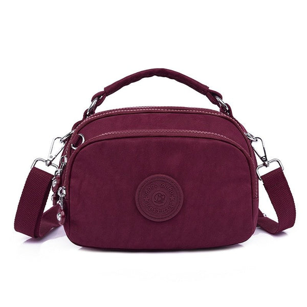 bolsa kiplybolsa impermeávelbolsa feminina kiplybolsa femininaBolsa Compacta Impermeávelbolsabolsa compactabolsa de mulherbolsa dia a diabolsa pequena