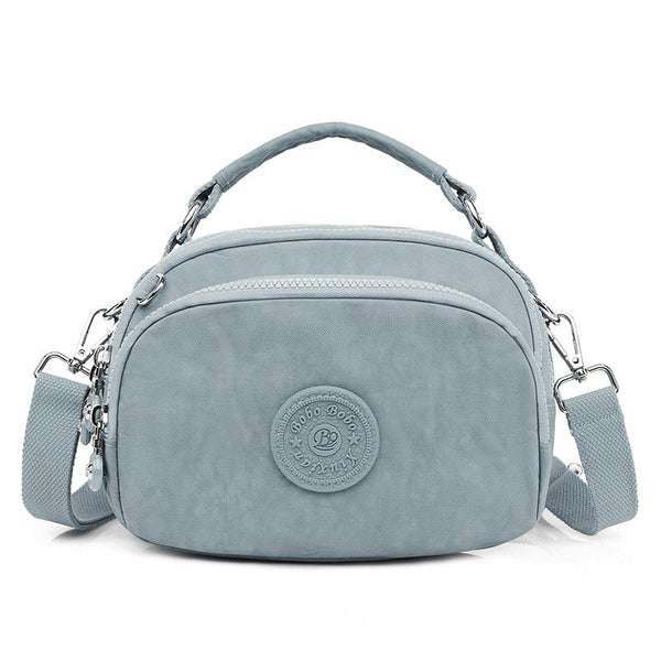 bolsa kiplybolsa impermeávelbolsa feminina kiplybolsa femininaBolsa Compacta Impermeávelbolsabolsa compactabolsa de mulherbolsa dia a diabolsa pequena