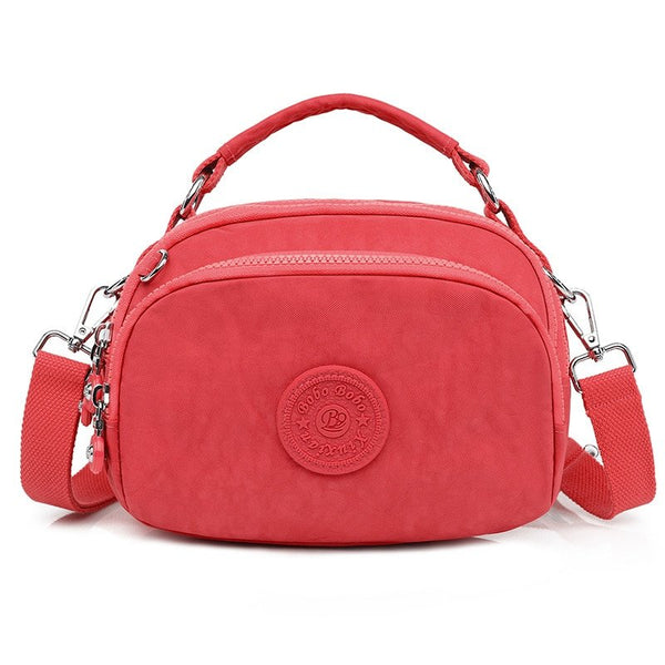 bolsa kiplybolsa impermeávelbolsa feminina kiplybolsa femininaBolsa Compacta Impermeávelbolsabolsa compactabolsa de mulherbolsa dia a diabolsa pequena
