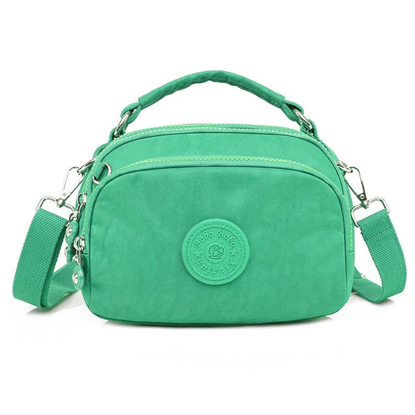 bolsa kiplybolsa impermeávelbolsa feminina kiplybolsa femininaBolsa Compacta Impermeávelbolsabolsa compactabolsa de mulherbolsa dia a diabolsa pequena