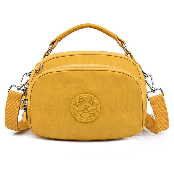 bolsa kiplybolsa impermeávelbolsa feminina kiplybolsa femininaBolsa Compacta Impermeávelbolsabolsa compactabolsa de mulherbolsa dia a diabolsa pequena