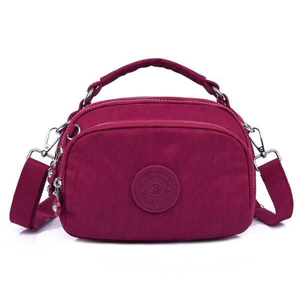 bolsa kiplybolsa impermeávelbolsa feminina kiplybolsa femininaBolsa Compacta Impermeávelbolsabolsa compactabolsa de mulherbolsa dia a diabolsa pequena